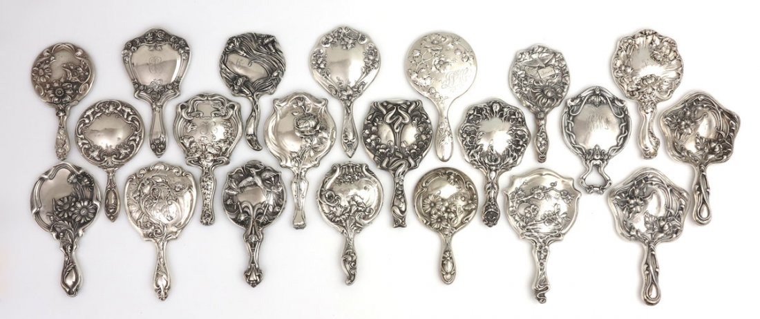 COLLECTION OF ART NOUVEAU STERLING HAND MIRRORS: COLLECTION OF ART NOUVEAU STERLING HAND MIRRORS: 21 pieces to include 1) 3 large flowers, marked Sterling. 2) Simons Brothers roses top and bottom. 3) Woodside 3 flowers, upward left swirls. 4) Uniden
