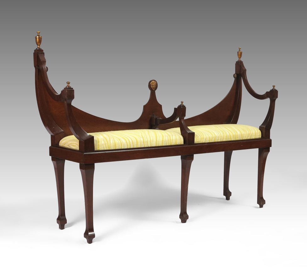 ITALIAN REGENCY STYLE SETTEE: ITALIAN REGENCY STYLE SETTEE: Shaped back with gilt finials and applied decoration. 2 section seat with central arm rest, Flowing stripes of yellow, gold, and white upholstery. 36 3/4" h. x 52 3/4" x 