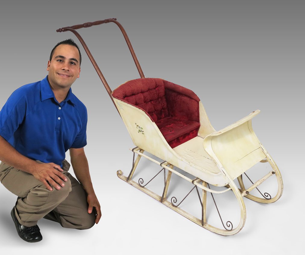 PAINT DECORATED ANTIQUE CHILD'S SLED: PAINT DECORATED ANTIQUE CHILD'S SLED: Paint decorated body with upholstered seat, unmarked as to maker. 33 1/4" h x 16" x 54 1/2".