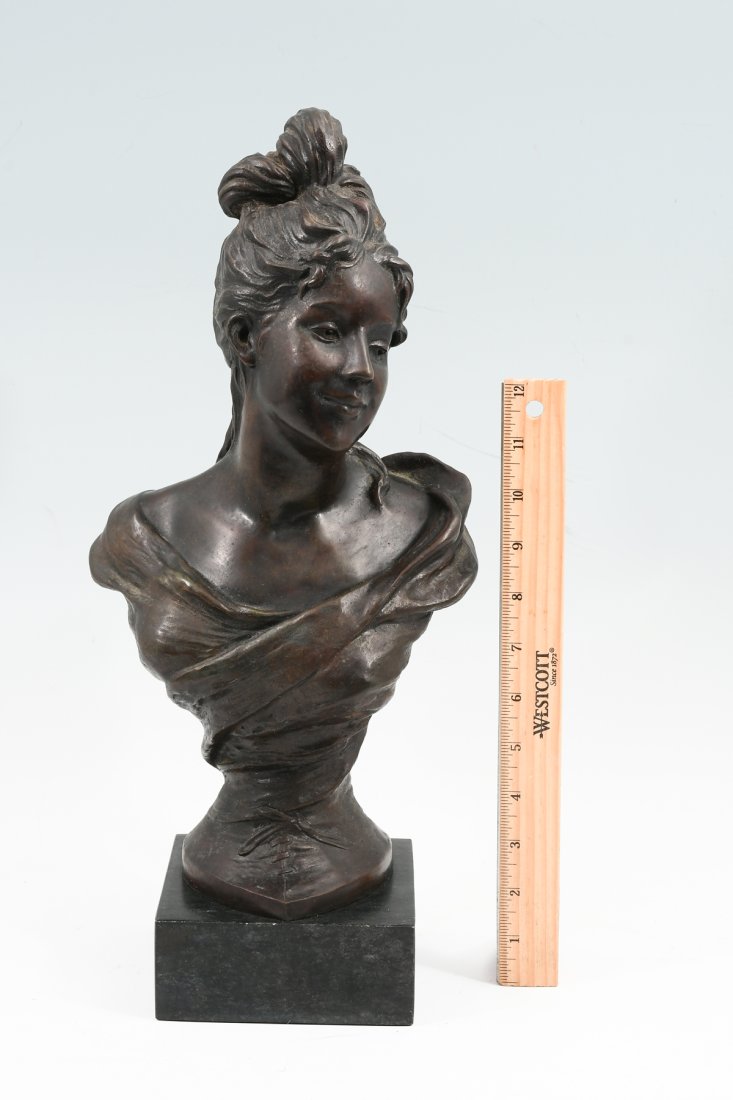 BUST OF A NEOCLASSICAL MAIDEN SIGNED LEVASSEUR: BRONZE BUST OF A NEOCLASSICAL MAIDEN SIGNED LEVASSEUR: 15'' in height, affixed to a marble plinth, 17'' in height overall.