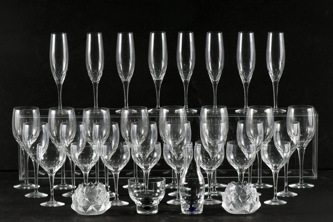 ORREFORS CRYSTAL STEMWARE: ORREFORS CRYSTAL STEMWARE: This collection of Prelude pattern crystal stemware by Orrefors consists of: 8- water goblets (8.25" h), 8- Champagne flutes (8 3/8"), 8- Claret glasses(7 3/8"), and 8- whit