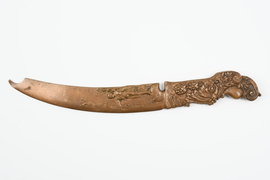 HENRY BONNARD BRONZE ART NOUVEAU LETTER OPENER: HENRY BONNARD BRONZE ART NOUVEAU LETTER OPENER: A Henry Bonnard Bronze Co., NY, Bronze Commemorative Letter Opener, ca. 1904. Having foliate scroll & figural decoration, commemorating the winning of t