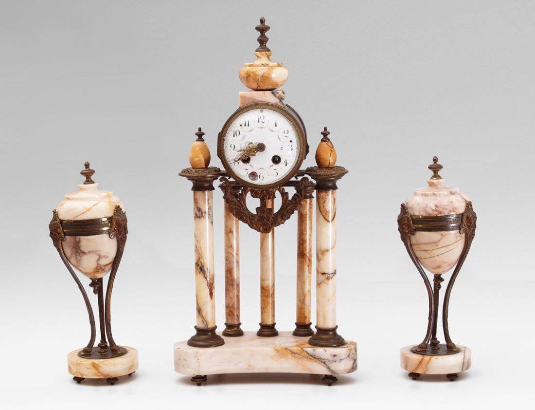 FRENCH MARBLE PORTICO CLOCK GARNITURE SET: FRENCH MARBLE PORTICO CLOCK GARNITURE SET: Urn finial over 5 columns with shaped base on 4 feet. Brass case with applied embossed decoration. Hand painted porcelain dial, replacement hands. Japy Frere