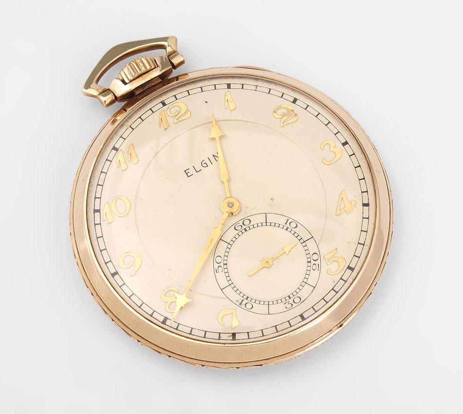 ELGIN CA. 1930 OPEN FACE POCKET WATCH IN ORIG BOX: ELGIN ART DECO ELGIN OPEN FACE POCKET WATCH: Ca. 1930. Gold filled case, size 12. 19 jewel mechanical movement with gold settings and micro adjuster on the balance, nice Swiss stripes old Damasking pa