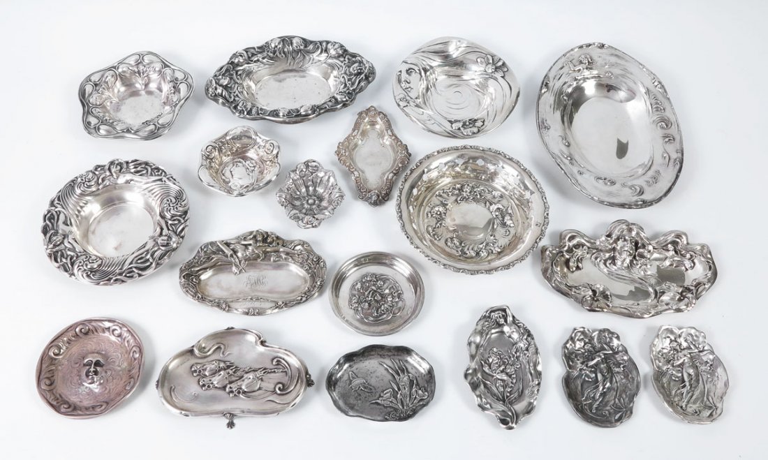 18 ART NOUVEAU STERLING TRAYS MAUSER, KERR & MORE: 18 ART NOUVEAU STERLING TRAYS: To include 1) Alvin with 3 figural women's bust. 2) Mauser floral pattern. 3) Mauser with pierced sides, embossed woman and foliate scroll base. Note damage to side. 4) 