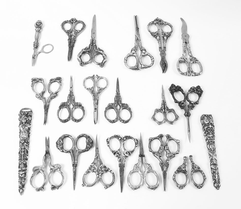 COLLECTION OF ART NOUVEAU STERLING SCISSORS: COLLECTION OF ART NOUVEAU STERLING SCISSORS: To include 1) 2 desk scissors, one Simons Brothers, other with full body women. 2) Unusual scissors with woman bust handle. 3) 4 floral handle sewing sciss