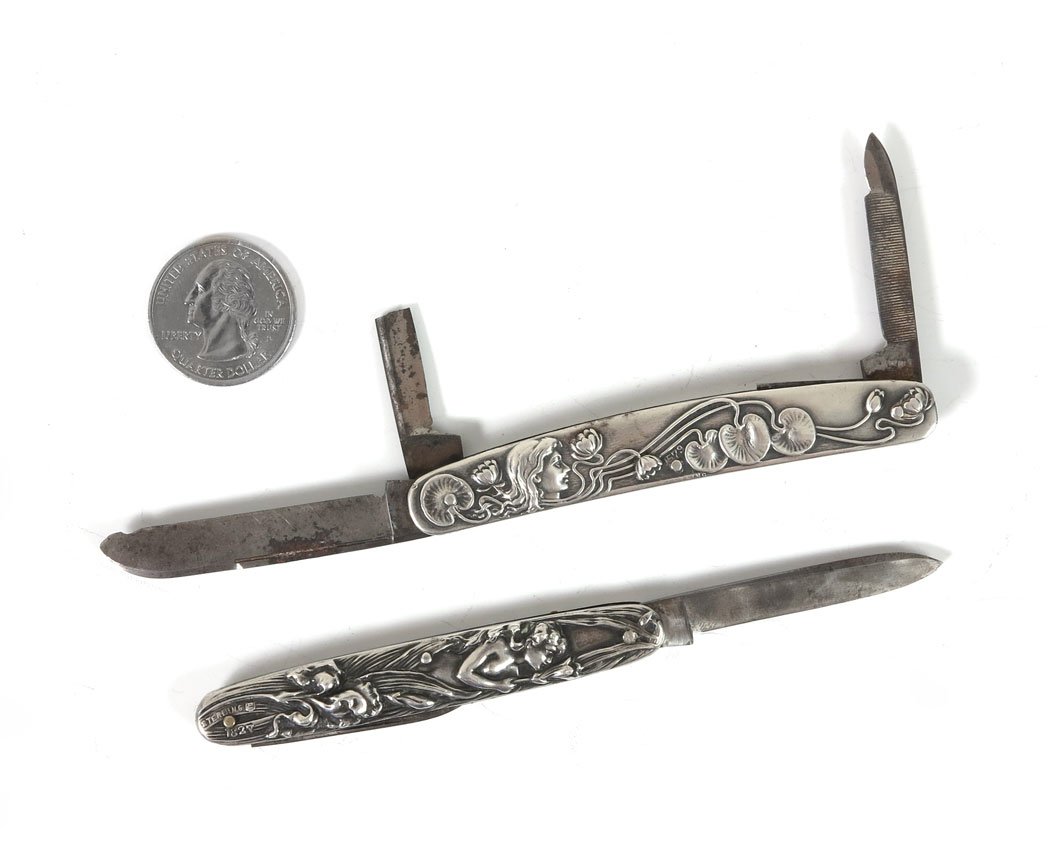 PAIR ART NOUVEAU STERLING POCKET KNIVES: PAIR ART NOUVEAU STERLING POCKET KNIVES: To include 1) Simons Brothers full figured woman and floral motif. 2) Simons Brothers woman's head in profile with water lilies. 3 3/8'' l. closed.