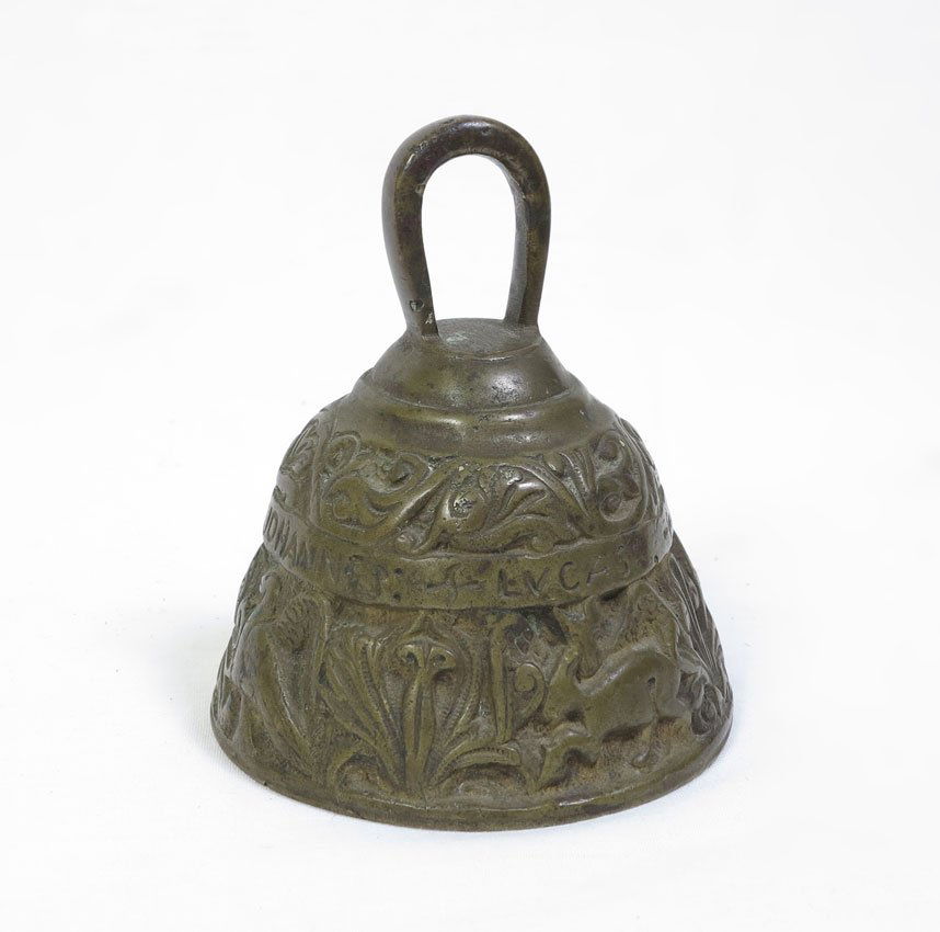 PORTUGUESE EVANGELISTIC BRONZE BELL: PORTUGUESE EVANGELISTIC TEMPLE BRONZE BELL: Cast with vignettes and apostles names in Latin of John, Mark, Luke and Matthew. 4 1/2" h. x 3 3/4". From the Estate of John Desmond and his wife Janina Har