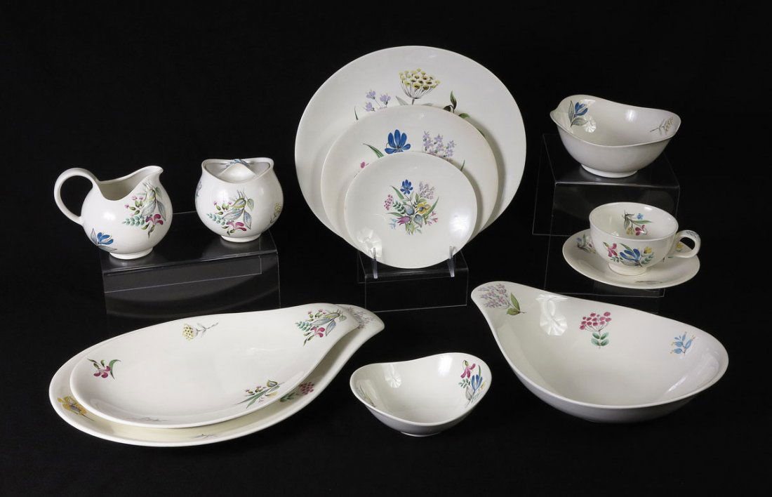 HALL EVA ZEISEL HALLCRAFT DINNERWARE: EVA ZEISEL HALLCRAFT DINNERWARE MADE BY HALL CHINA: Approx. 75 pieces to include 12 dinner plates (11" oval), 6 salad plates, 11 bread plates, 8 soup bowls, 8 dessert bowls, 12 cups and 12 saucers. Se