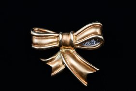TIFFANY & CO.18K GOLD, PLATINUM & DIAMOND BOW PIN