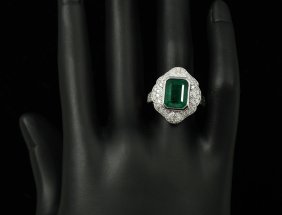 ART DECO PLATINUM EMERALD AND DIAMOND RING