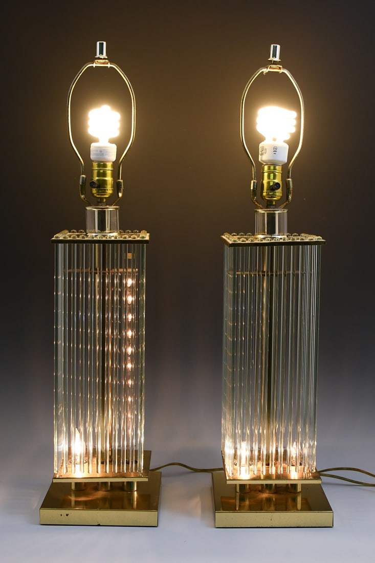 MID-CENTURY GAETANO SCIOLARI BRASS & GLASS LAMPS: MID-CENTURY GAETANO SCIOLARI BRASS & GLASS LAMPS: A pair of Mid-Century Gaetano Sciolari for Lightolier Brass and Glass Rods Table Lamps. Circa 1970s. Approx. 22" h x 7" w x 7" d.