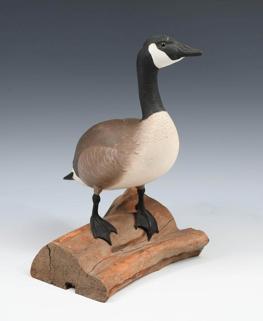 ROBERT & VIRGINIA WARFIELD CANADIAN GOOSE CARVING: ROBERT & VIRGINIA WARFIELD CANADIAN GOOSE DECOY CARVING: A finely carved & decorated Miniature Canadian Goose sculpture on a driftwood base, by Robert & Virginia Warfield of Jaffrey, New Hampshire. On