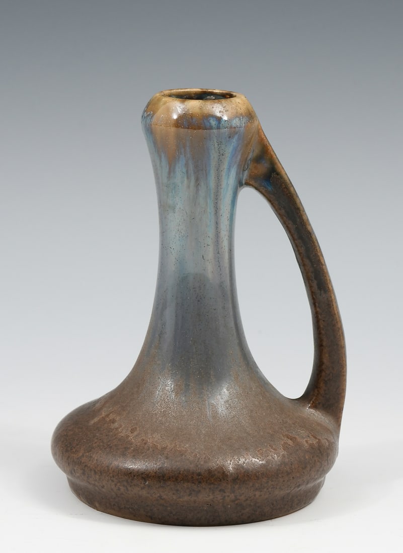FULPER POTTERY EWER: FULPER POTTERY EWER: Thick blue to a matte brown glaze. Vertical oval Fulper Hallmark. Approx. 4.5" h x 3.375" w x 3.25" w.