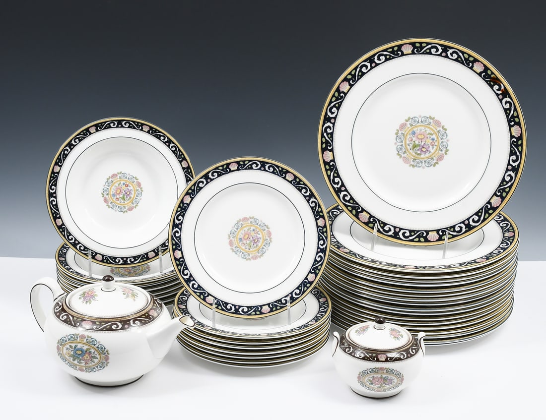 69 PC. WEDGWOOD "RUNNYMEDE" CHINA: 69 PC. WEDGWOOD "RUNNYMEDE" CHINA: Comprising; 18- Dinner Plates, 15- Tea Cups, 18- Saucers, 8- Soup Bowls, 8- Salad Plates, 1- Teapot, & 1- Covered Sugar Bowl, 1- Creamer, & 1- Oval Serving Platter.