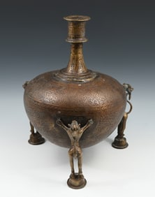 BRONZE TRI-FOOTED ISLAMIC VESSEL