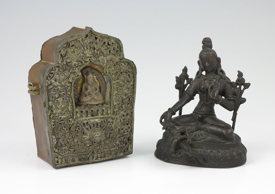 TIBETAN GAU SHRINE & DEITY: 2 PIECE TIBETAN GAU AND SEATED BUDDHIST FIGURE: 1) Tibetan Gau or traveling shrine box in mihrab form and having its own personal clay deity (loose). Copper and repousse metal. In the home, the Gau wa