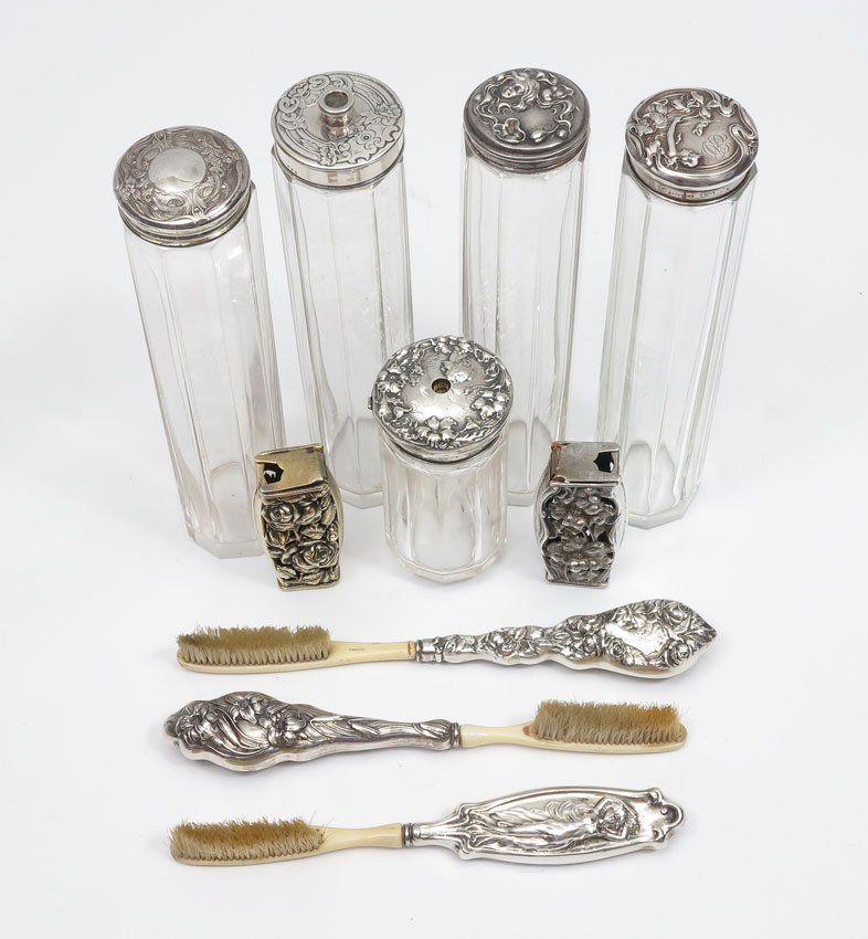ART NOUVEAU STERLING SILVER DENTAL ITEMS: ART NOUVEAU STERLING SILVER DENTAL ITEMS: To include; 1) 3 sterling handled toothbrushes, full bodied woman marked sterling, floral by Unger Bros, and woman's head by Foster & Bailey; 2) Two different
