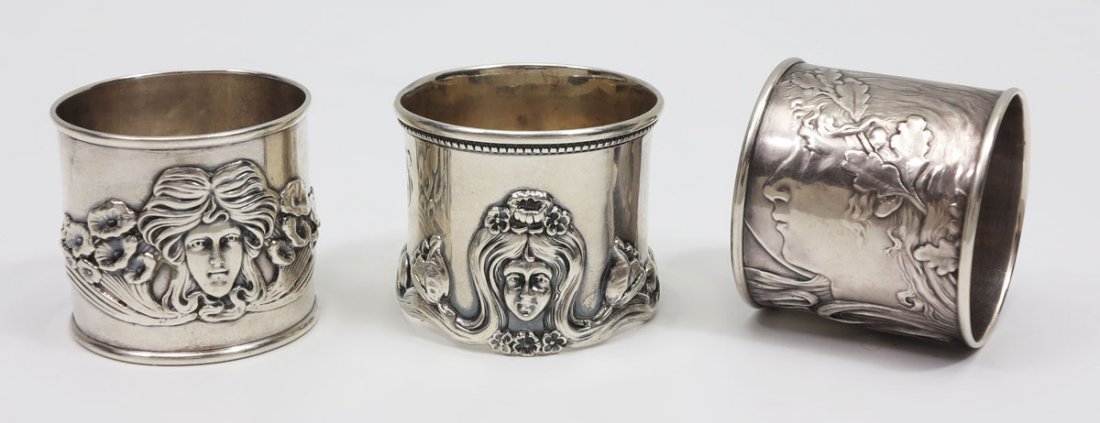 ART NOUVEAU STERLING SILVER FIGURAL NAPKIN RINGS: ART NOUVEAU STERLING SILVER NAPKIN RINGS: Circular ones with female face by Unger Bros, and Kerr. Includes 3 pieces, 2 pieces are monogrammed. 3.1 Troy oz.