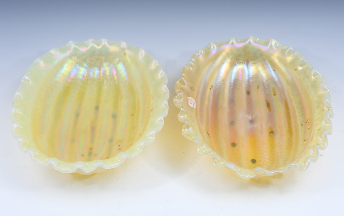 PR. AUSTRIAN LOETZ IRIDESCENT CENTER BOWLS: PR. AUSTRIAN LOETZ IRIDESCENT CENTER BOWLS: Pair of Austrian Loetz art glass Center bowls. Iridescent Yellow Melon form, having a crimped rim with textured ribbed body. One etched, "Aurene, 34". Appro