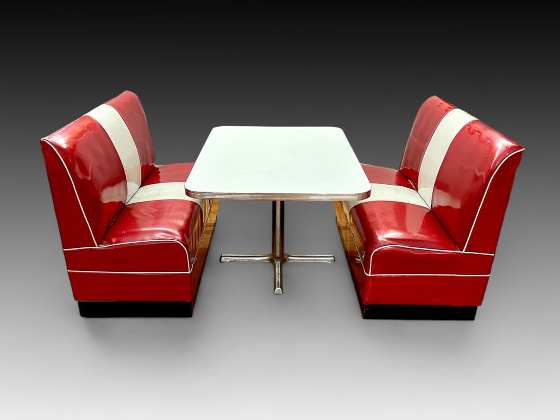 50'S RETRO DINER BENCHES & TABLE: 50'S RETRO DINER BENCHES & TABLE: Comprising; 2- Metallic flecked Red & White vinyl upholstered benches, & 1- Laminate top table with chromed ribbed trim. Table Approx. 29.25" h x 48" l x 35.75" w. Be
