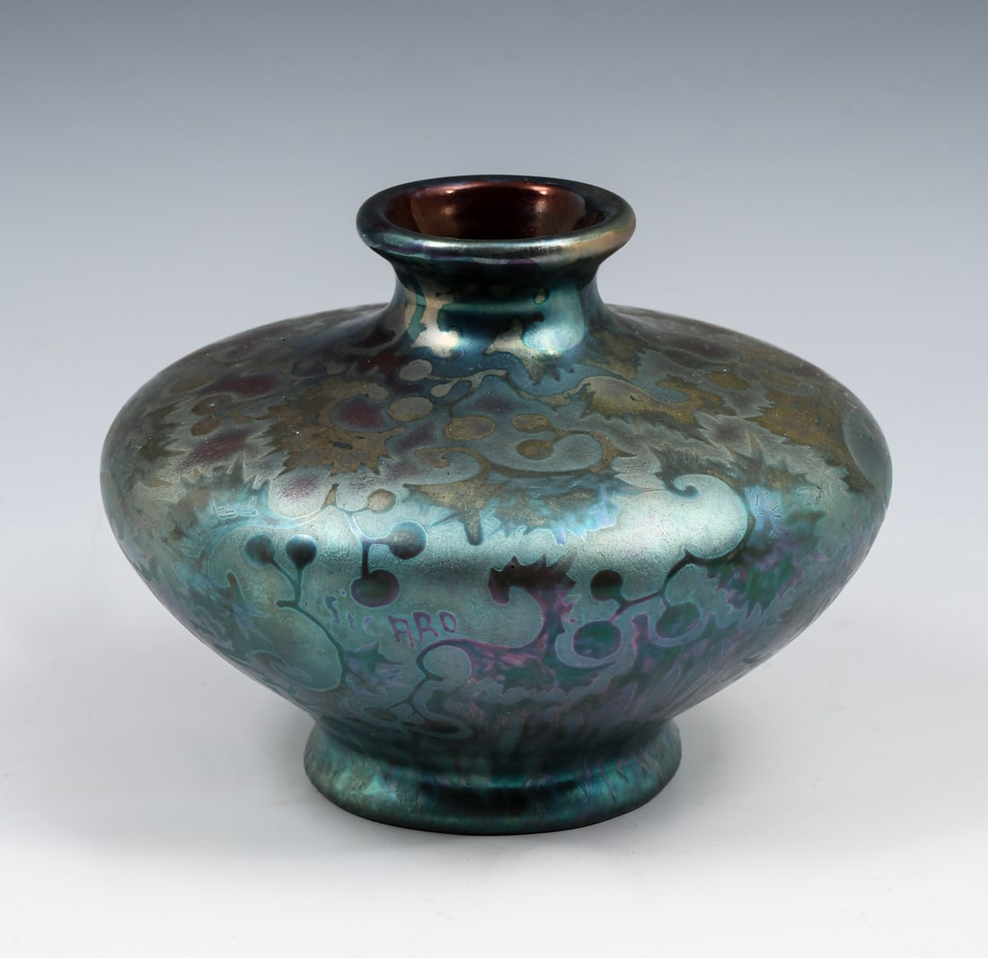 WELLER SICARD ART POTTERY LOW VASE: WELLER SICARD ART POTTERY LOW VASE: Jacques Sicard (1865-1923) for Weller Pottery Company, low vase, having a metallic glazed stylized foliate decoration. Signed at the shoulder. Approx. 4.5" h x 6" D