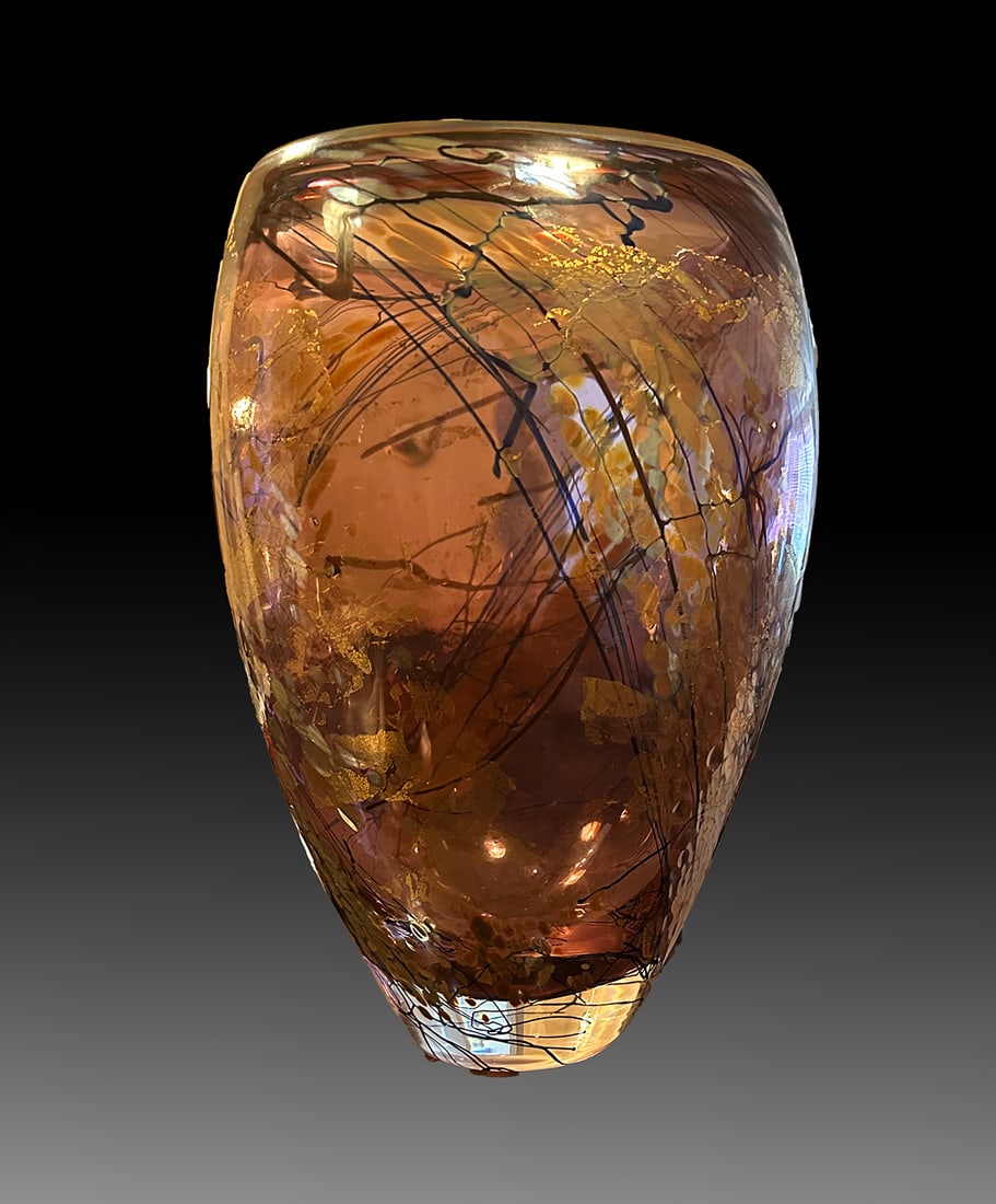 SIGNED TIM LAZER STUDIO ART GLASS VASE: SIGNED TIM LAZER STUDIO ART GLASS VASE: A light purple art glass vase, by Tim Lazer Studios, having an abstract design with Iridescent & Gold flake accents, Signed at the underside, 1992. Approx. 12.7