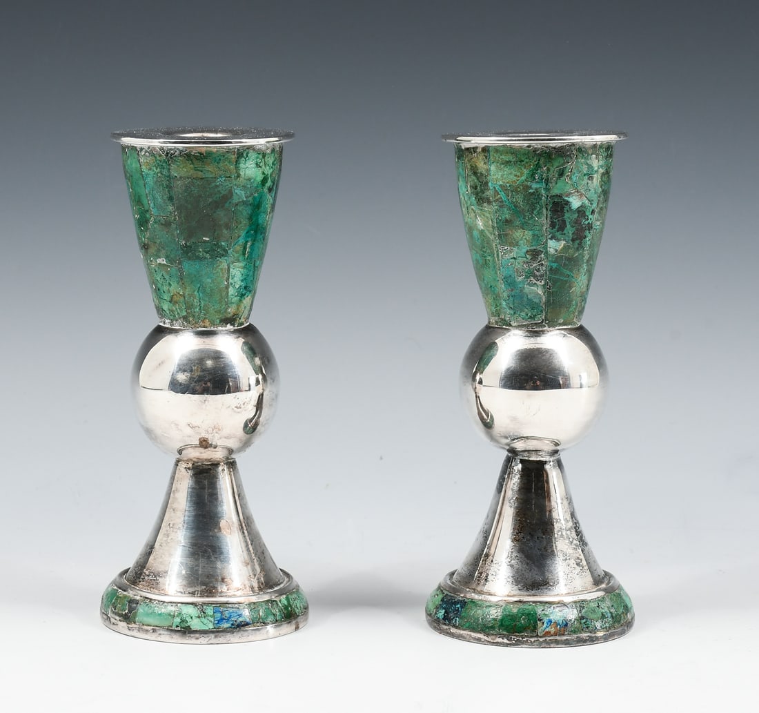 LOS CASTILLOS MEXICAN SILVER PLATED CANDLESTICKS: PAIR LOS CASTILLOS MEXICAN SILVER PLATED CANDLESTICKS: A Los Castillo Hardstone Inlaid Silver-Plated Pair of Candlesticks, Taxco, Mexico, mid-20th century. Impressed marks at underside. Approx. 6.625"