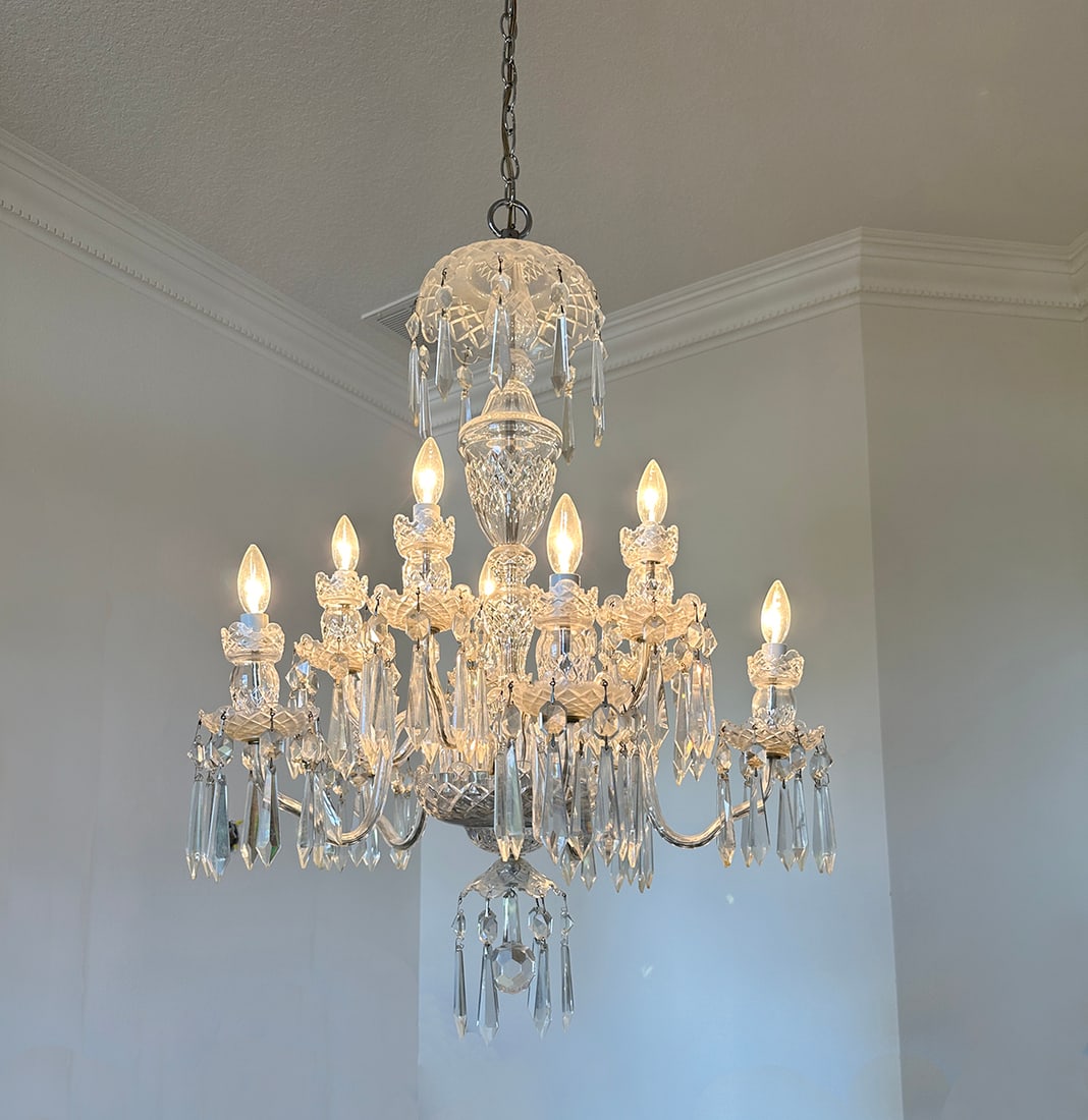 FABULOUS WATERFORD CRYSTAL CHANDELIER: FABULOUS WATERFORD CRYSTAL CHANDELIER: A Waterford Crystal 10- Light chandelier, having scrolling arms terminating in Bobeche adorned in multi-faceted prisms. Approx. 40" h x 28" Dia.
