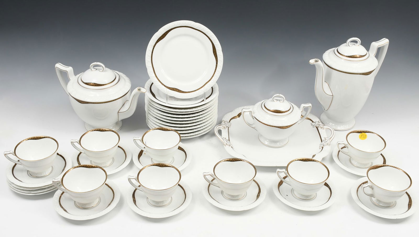 37 PC. BERNARDAUD LIMOGES WEINER PATTERN CHINA SET: BERNARDAUD LIMOGES WEINER PATTERN SECESSIONIST STYLE CHINA SET: Comprising; 12- Luncheon / Salad Plates, 12- Saucers, 9- Teacups, 1- Teapot, 1- Coffee Pot, 1- Square serving dish, & 1- Lidded Sugar Bo