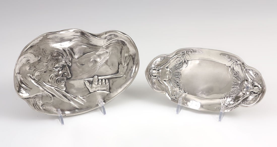 2 ART NOUVEAU STERLING TRAYS: 2 ART NOUVEAU STERLING TRAYS: 2 pieces total to include 1) Unger Brothers figural man smoking pipe, 7 3/4'' x 5 1/2''. 2) Gorham with figural semi nude women at either end, 7 3/8'' x 3 3/4''. Approx. 