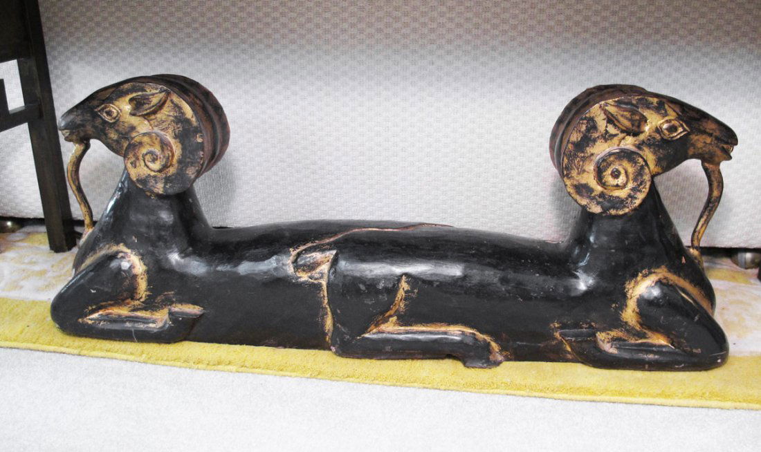 CARVED RAMS FROM EGYPTIAN TUTANKHAMUN EXHIBITION: CARVED RAMS FROM EGYPTIAN TUTANKHAMUN EXHIBITION: Decorative ebonized carved wood with gilt decoration. From the Spring, 1979 exhibition. Measures 15" h. x 39" x 7 3/4".