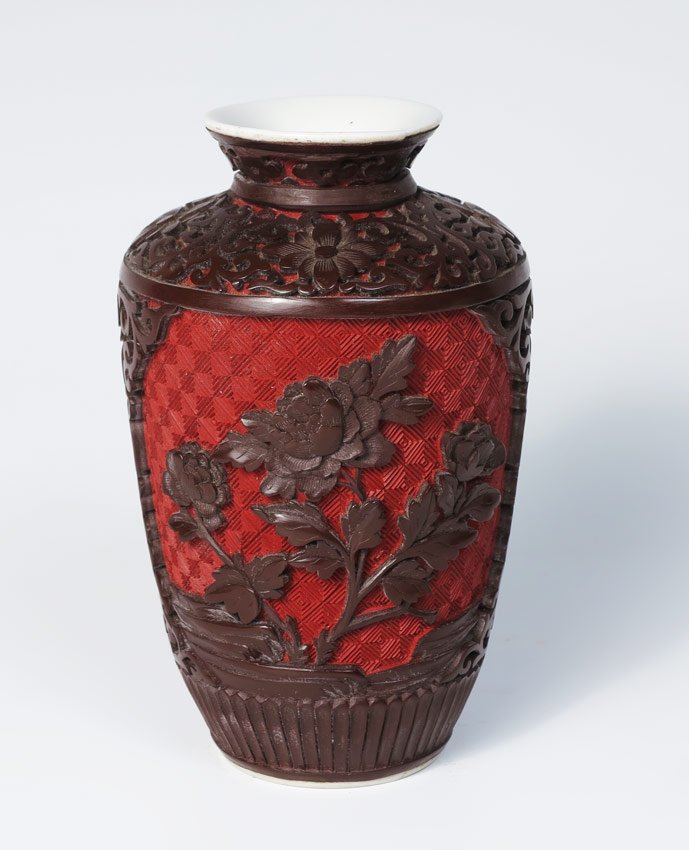 5" CINNABAR ON PORCELAIN VASE: CARVED LACQUER CINNABAR ON PORCELAIN VASE: 5" tall