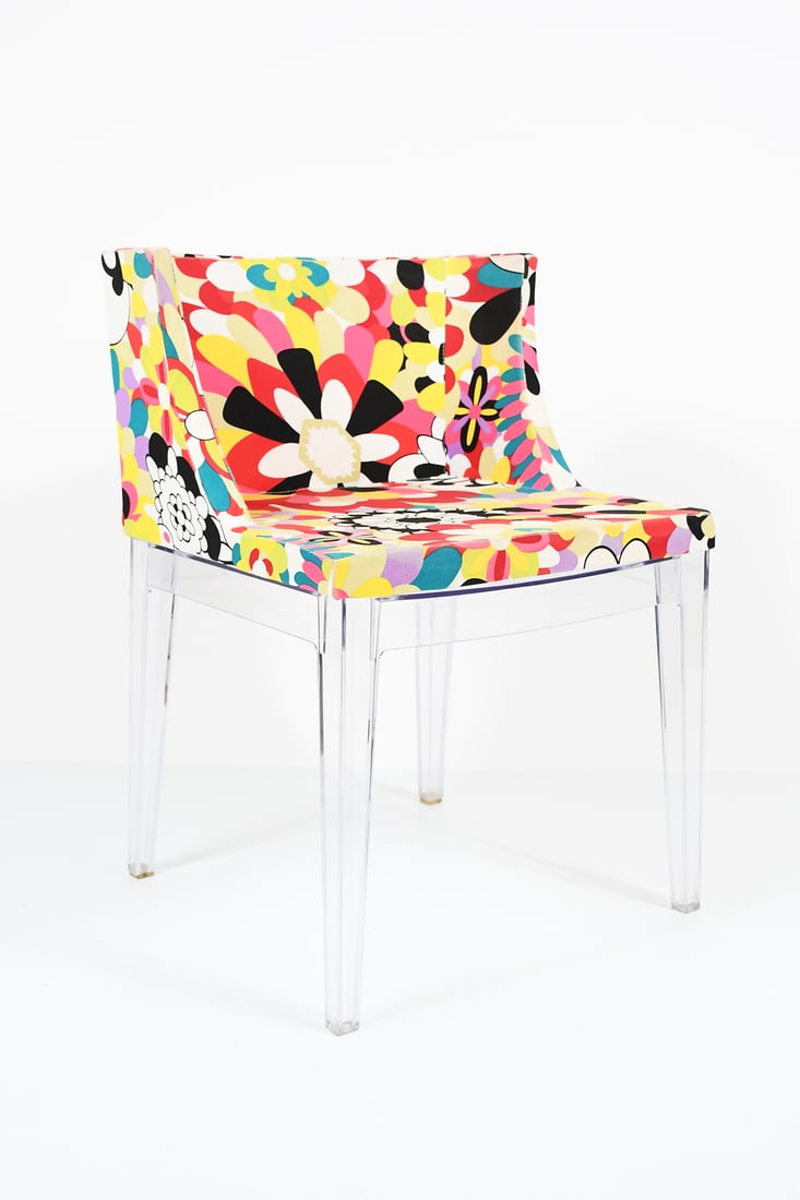 PHILIPPE STARCK MISSONI "MADEMOISELLE" CHAIR: PHILIPPE STARCK MISSONI "MADEMOISELLE" KARTELL CHAIR: Missoni chair by Philippe Starck for Kartell. Colorfully upholstered with Missoni fabric on an acrylic frame. Approx. 29.5" h x 20.75" w x 19.75"
