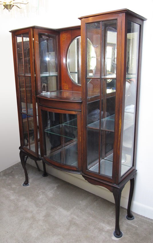 EDWARDIAN - ART NOUVEAU INLAY ETAGERE CABINET: EDWARDIAN ETAGERE DISPLAY CABINET: Central section with beveled oval mirror surrounded by mirrored back, glass front display cases. Measures approx. 67" tall x 47" wide x 17" deep..