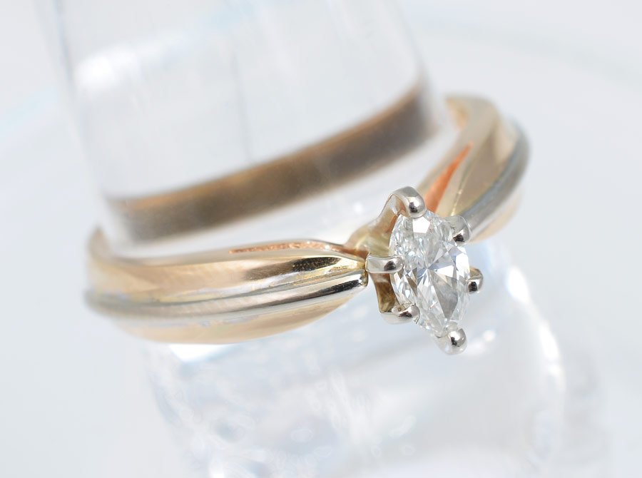 .25 CT DIAMOND MARQUISE ENGAGEMENT RING SZ 8: .25 CT. MARQUIS DIAMOND SOLITAIRE RING: 14K yellow gold ring contains one marquise cut diamond. Weight: .25 Ct. Approx. Rated SI1 in clarity and I in color. The diamond is prong set. Weight: 4.8 grams