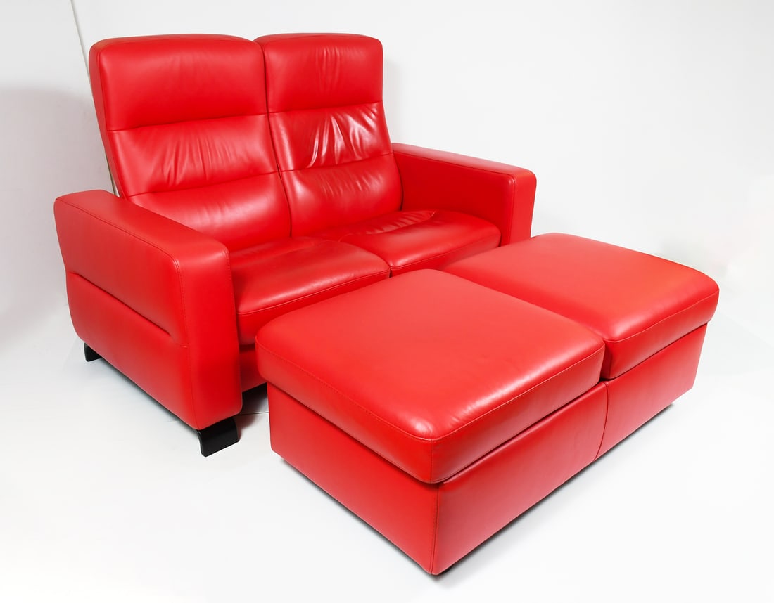 EKORNES RED LEATHER LOVE SEAT & STORAGE OTTOMAN: EKORNES RED LEATHER LOVE SEAT & STORAGE OTTOMAN: Ekornes Red Leather Love seat / Sofa with two recliners. Oversized Red Leather Ottoman with roomy storage below cushions. Sofa Approx. 39" h x 56.5" w