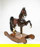 TOM LOVELL CARVED ROCKING HORSE