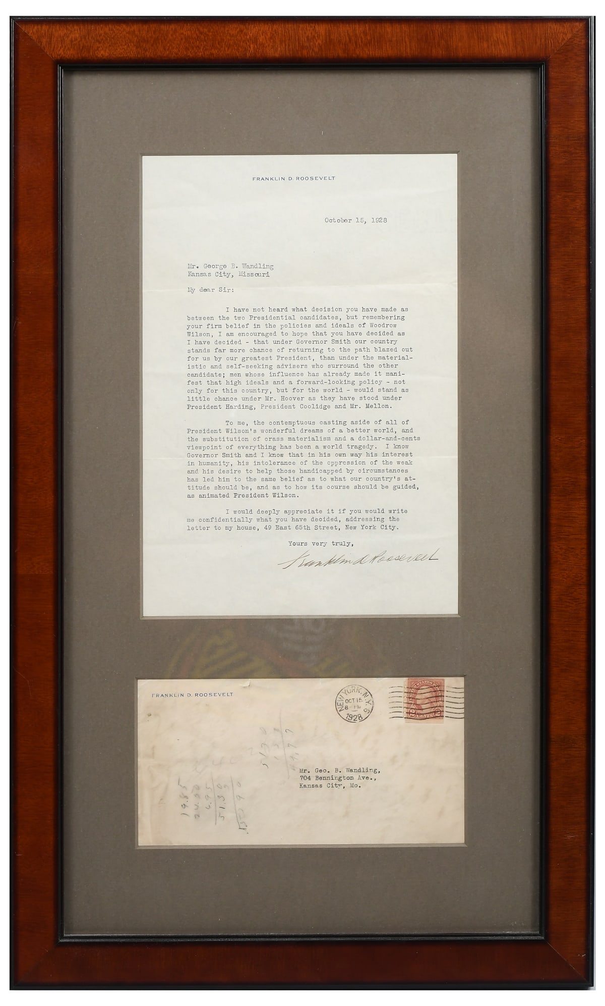 FRAMED FRANKLIN D. ROOSEVELT LETTER AND ENVELOPE: FRAMED FRANKLIN D. ROOSEVELT LETTER AND ENVELOPE: A framed display containing a letter from Franklin Roosevelt dated October 15th, 1928, and its envelope. The letter concerns the then-upcoming 1928 pr
