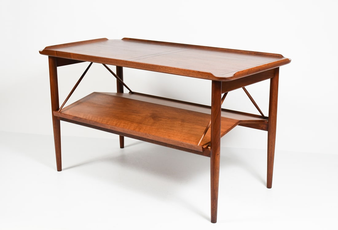 FINN JUHL LIBRARY WALNUT TABLE: FINN JUHL WALNUT LIBRARY TABLE: A less common Danish Mid-Century Modern Finn Juhl "503 1/2" library Table for Baker. Finn Juhl was a Danish Modern design pioneer. Approx. 26.75" h x 46.75" w x 23.75" 
