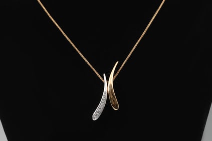 MODERNIST 18K TWO-TONE DIAMOND PENDANT