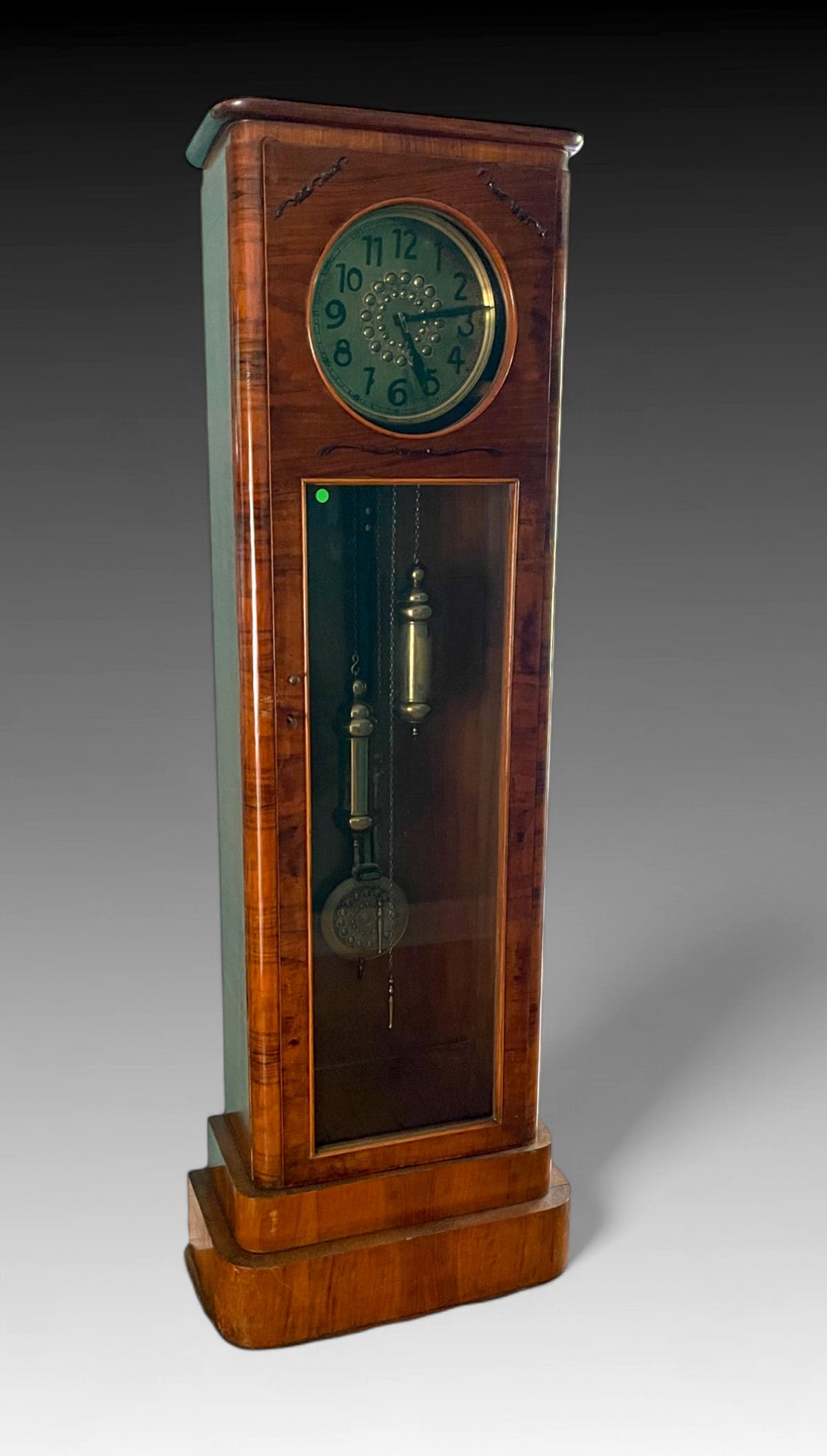 GERMAN BIEDERMEIER GRANDFATHER CLOCK: GERMAN BIEDERMEIER GRANDFATHER CLOCK: German Biedermeier Grandfather clock with a Beaded Brass Face. Floral motif Pendulum. Extra Gridiron Pendulum included. Badische Uhrenfabrik Movement. Approx. 73.