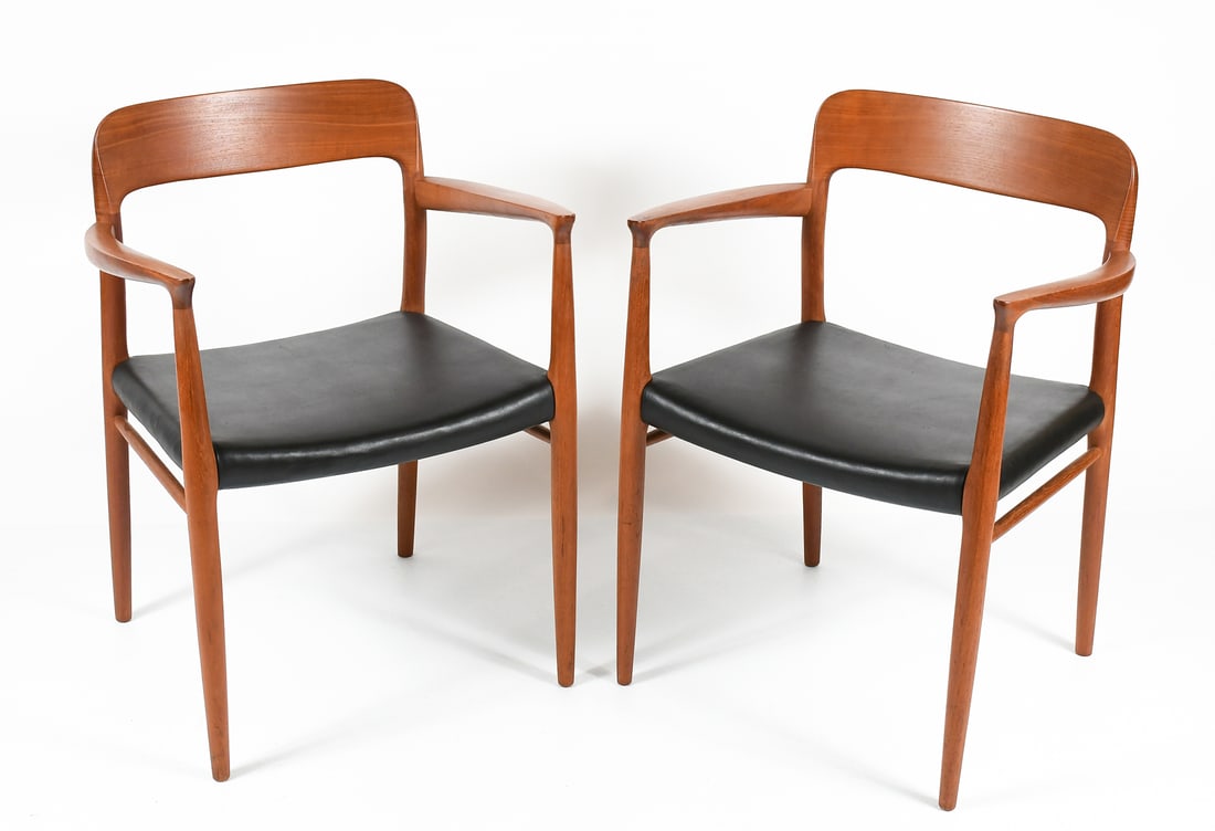 2 PC. NEILS MOLLER MODEL 56 TEAK ARMCHAIRS: 2 PC. NEILS MOLLER MODEL 56 TEAK ARMCHAIRS: Pair of Niels Moller Model 56 Teak Armchair for J L Mollers Mobelfabrik. Circa early 1950's. Approx. 30.25" h x 22.75" w x 2" d.