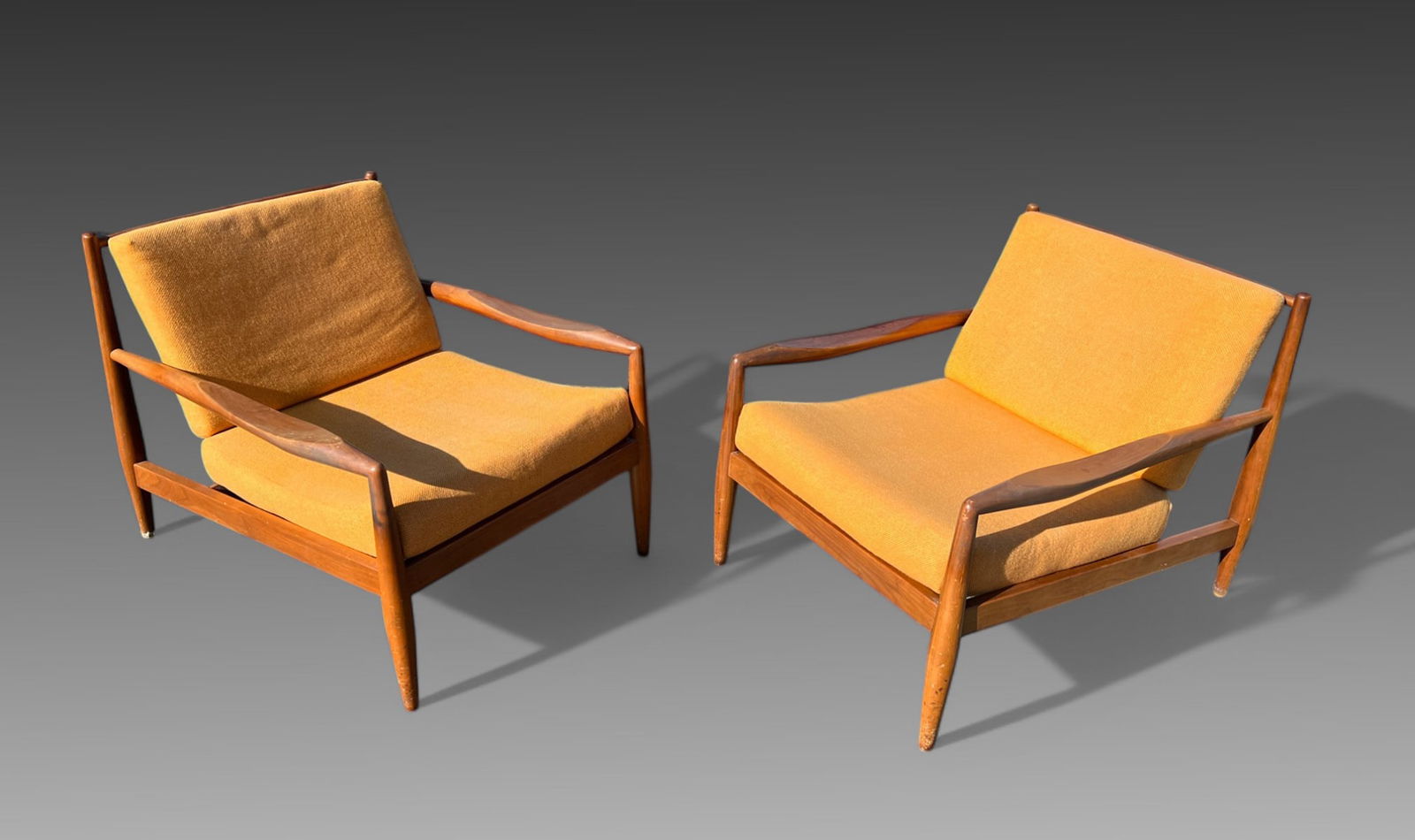 PR. OF DANISH ADRIAN PEARSALL SPINDLE CHAIRS: PR. OF ADRIAN PEARSALL FOR CRAFT ASSOCIATES SPINDLE CHAIRS: Pair of Adrian Pearsall for Craft Associates Spindle back Lounge / Armchairs. Approx. 27.5" h x 27.125" w x 34.75" d.