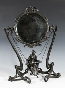 ART NOUVEAU MIRROR WITH FIGURE ON SWING