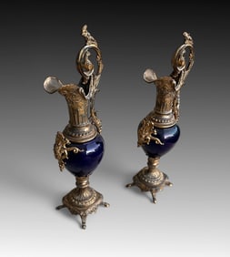 PAIR OF GILT METAL MOUNTED FIGURAL EWERS