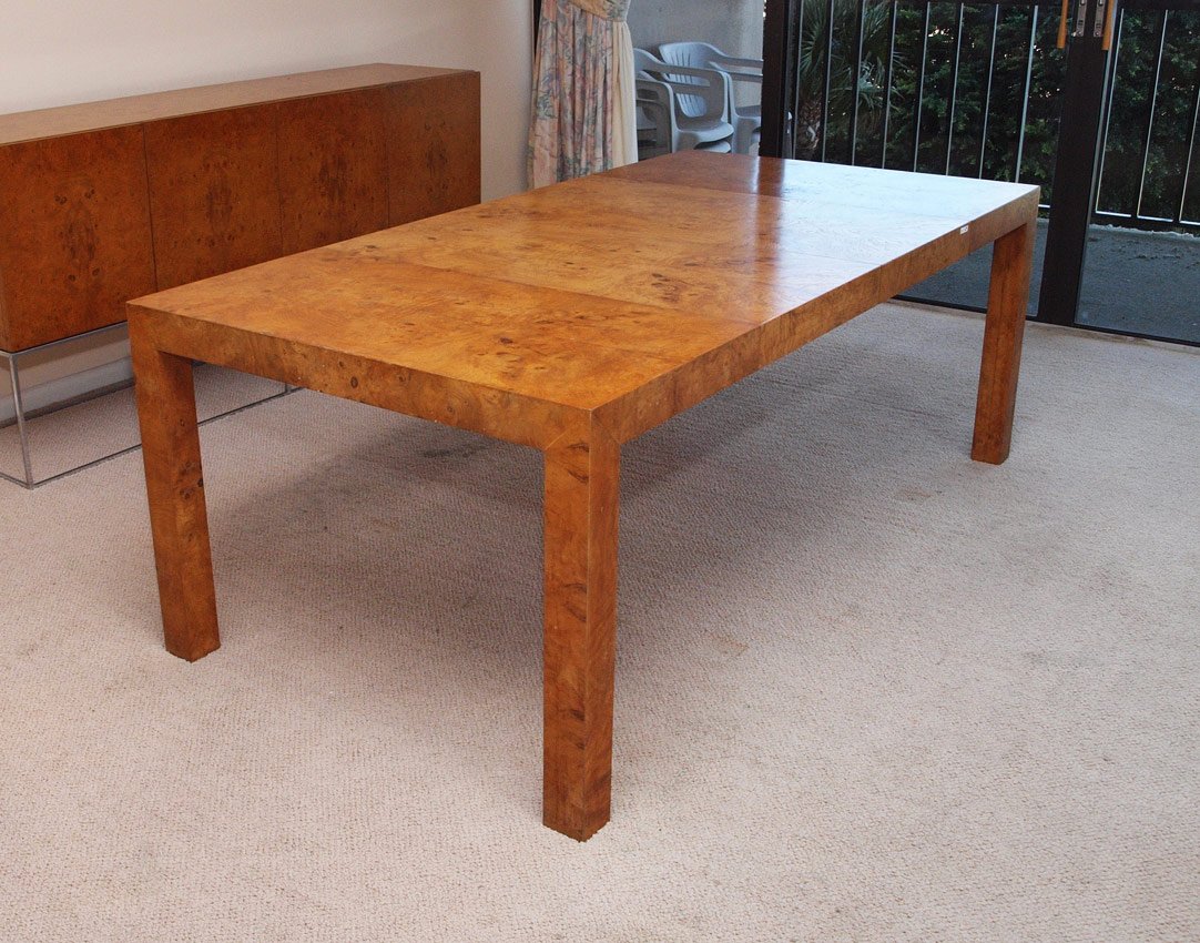 MILO BAUGHMAN BURL DINING TABLE: OLIVE BURL DINING TABLE BY MILO BAUGHMAN: 28'' tall x 39'' square, the pair of 22'' leaves extend the table to 83''L.