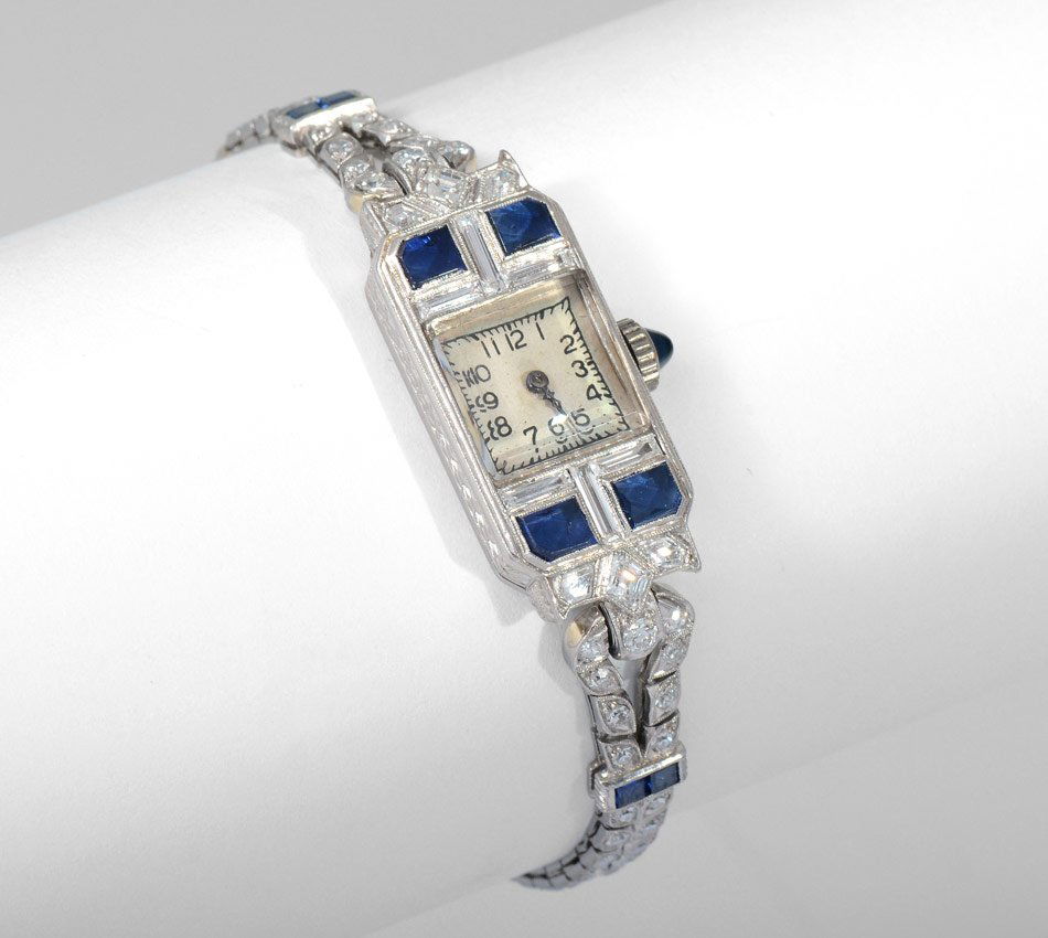 AUDEMARS PIGUET DIAMOND & SAPPHIRE DRESS WATCH: AUDEMARUS PIQUET DIAMOND & SAPPHIRE DRESS WATCH: Platinum ladies watch and bracelet with diamonds from tip to tip. The 92 diamonds total approx. 2.15 Ct., averaging VVS-VS in clarity and F-G color. Th