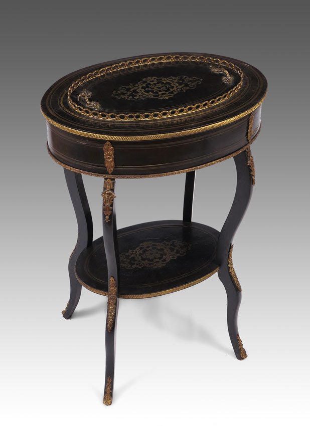 EBONIZED BOULLE INLAY FERNER / PLANTER: EBONIZED BOULLE INLAY FERNER / PLANTER: Ormolu gallery, boulle inlay top center section opens to metal insert. Applied ormolu decoration sides and on shaped legs. Lower stretcher shelf with matching b
