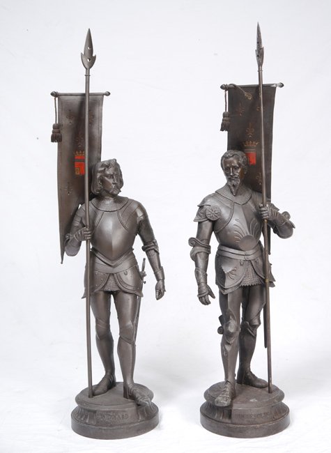 PAIR SPELTER FRENCH CHEVALIER SOLDIER FIGURES: PAIR SPELTER FRENCH CHEVALIER SOLDIER FIGURES: Figures of famous French knights Du Guesclin and Bayard. Each holding spear and banner, 39 3/4" h. x 10 1/4".